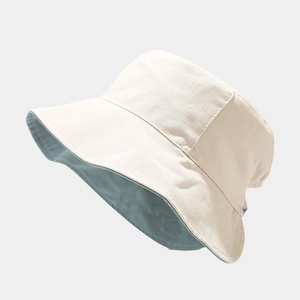 Cappello da sole reversibile da donna beige e azzurro con tesa larga e protezione UV