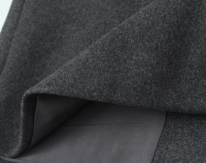 Macro texture de laine gris anthracite avec détail de doublure intérieure lisse et dense