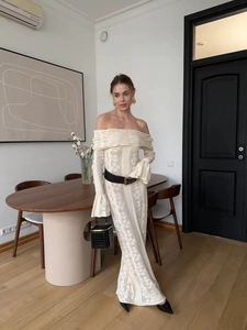 Elegant off-shoulder hollow knit long dress in cream white with a slim fit silhouette