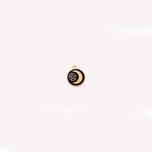 Detailed view of gothic crescent moon and star black enamel round pendant charm
