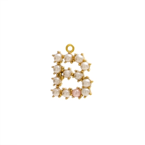 Detail of letter B pendant with gold metal and white pearls featuring a pink pearl accent