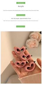 Detail of pink acrylic heart hair clip with smooth ceramic texture and 4.5cm size