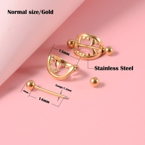 Detail showing gold stainless steel teeth-shaped nipple shield with size measurements