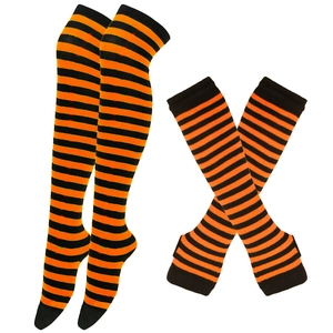 Macro detail of St. Patrick's Day knee-high socks and arm warmers with orange stripes
