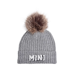 Detail of grey ribbed knit beanie with MINI embroidery and brown faux fur pom-pom
