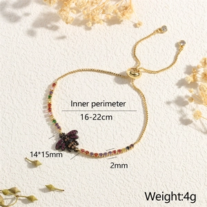 Macro detail of bee bracelet with zircon inlay and adjustable slide clasp specifications