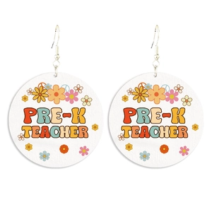 Detail of round wooden earrings featuring Pre-K Teacher text and vintage floral prints