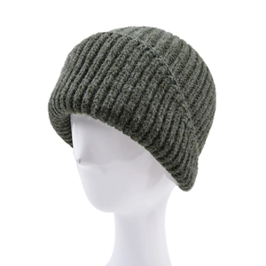 Deep green chunky knit beanie with wide cuff displayed on a head form for winter warmth