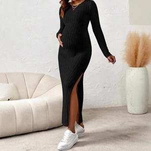 Slim fit black knitted long sleeve maternity dress with a side slit for pregnant women