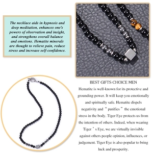 Macro detail of 6mm obsidian and tiger eye beaded necklace with hematite and OT toggle clasp