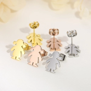 Three pairs of little girl stud earrings in gold, rose gold, and silver finishes