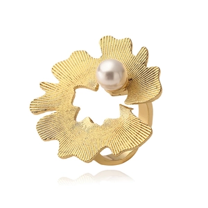 Detail of 18K gold-plated gingko leaf ring featuring a glossy white pearl accent