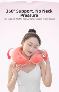Detailed close-up of pink memory foam neck pillow with ergonomic support and soft plush cover