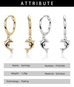 Macro view of 925 silver dolphin drop earrings in gold and silver plating