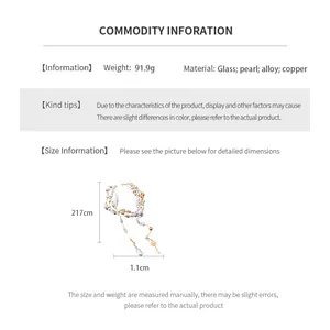 Detailed length chart for a 217cm long French pearl and gold key pendant necklace