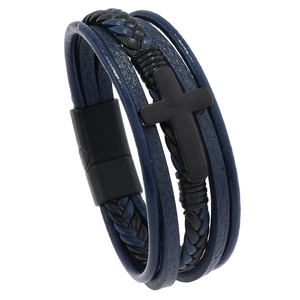 Close-up of multilayer leather bracelet featuring blue and black braids with a black cross