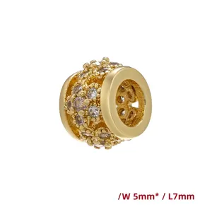 Detail of 18K gold-plated spacer bead with inlaid crystals, measuring 5mm wide by 7mm long
