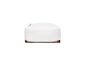 Detailed bottom view of a white vegan leather crossbody bag featuring fine edge stitching