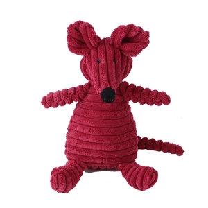 Close-up of deep red corduroy fabric texture on the squeaky plush mouse dog toy