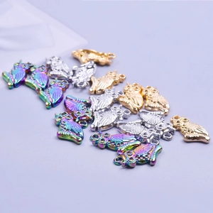 Stainless steel owl pendants with crystals in gold, silver and rainbow finishes