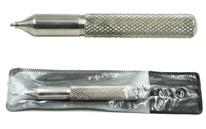 Macro detail of silver stainless steel dermal anchor tool with knurled anti-slip handle