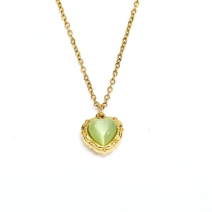 Detailed macro view of the heart-shaped green opal pendant on a fine 18k gold plated chain