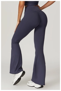 Rear view of high-waisted flare leggings showing butt-lifting effect and stretch fabric