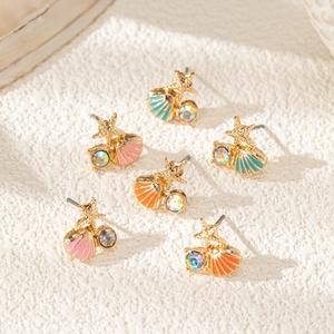 Asymmetric starfish and shell stud earrings in gold with colorful enamel and crystals