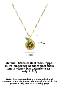 Detailed macro view of lemon pendant with green zircons and teal drop stone jewelry