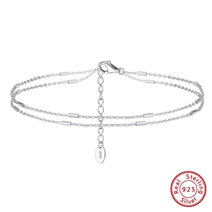 Double-layered S925 sterling silver anklet with fine beads and lobster clasp on white background