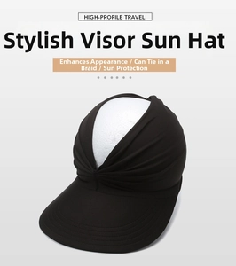 Detail of black open top sun visor with elegant twist design and wide sun protection brim