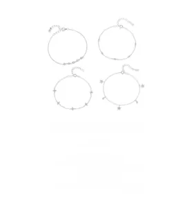 Macro detail of S925 sterling silver bracelets showing star clover charms and S925 hallmark