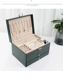 Three-layer dark green leather jewelry box with compartments and gold lock for organizers