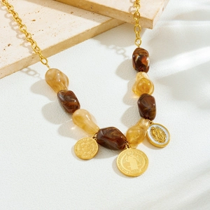 Vintage gold plated chain necklace with colorful beads and religious relief pendants