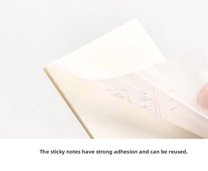 Close-up of clear sticky notes showing waterproof material and strong adhesive backing