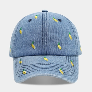 Light blue denim baseball cap with yellow lemon embroidery and curved brim for casual wear