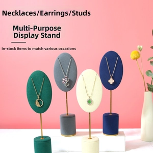 Velvet jewelry display stands for necklaces and earrings in multiple colors and heights