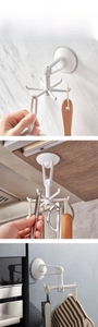 Close-up of white 360-degree rotating 6-claw wall hooks with strong suction cup base