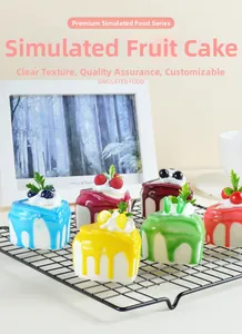 Detailed set of realistic heart-shaped fruit cake magnets with cream on a black rack