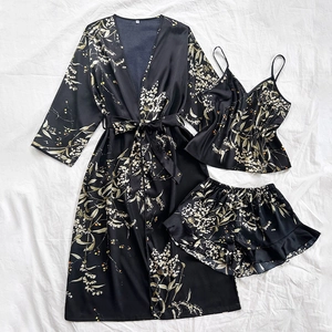 Three-piece floral satin sleepwear set with robe, camisole and ruffled shorts