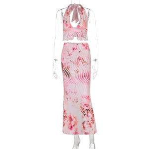 Detail of floral halter crop top and high-waist skirt set with wave texture