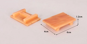 Detailed view of 6cm faux wood base for miniature Christmas trees and dioramas