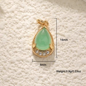 Detailed view of 18K gold teardrop pendant with green stone, 15mm by 8mm size specifications