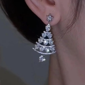 Sparkling Christmas tree earrings featuring micro-set cubic zirconia and a heart pendant
