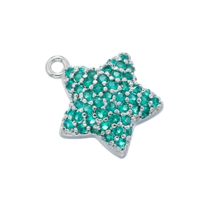 Detail view of 18K gold star pendant with emerald green crystals in pavé setting