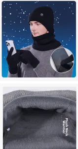 Detail of warm winter set with thick plush lining neck gaiter and touchscreen gloves