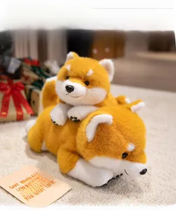 Close-up of plush Shiba Inu toy with orange and white fur in a cozy gift setting