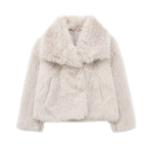 Close-up of women's short faux fur jacket in beige with premium soft plush texture
