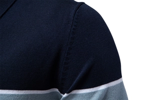 Close-up of knit fabric texture and premium shoulder seam stitching on navy polo shirt
