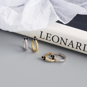 Detailed close-up of S925 sterling silver hoop earrings with black and white zircon